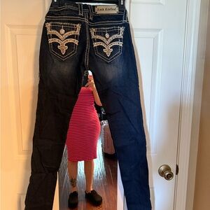 Rock Revival Black Skinny Jeans with Sleek Design